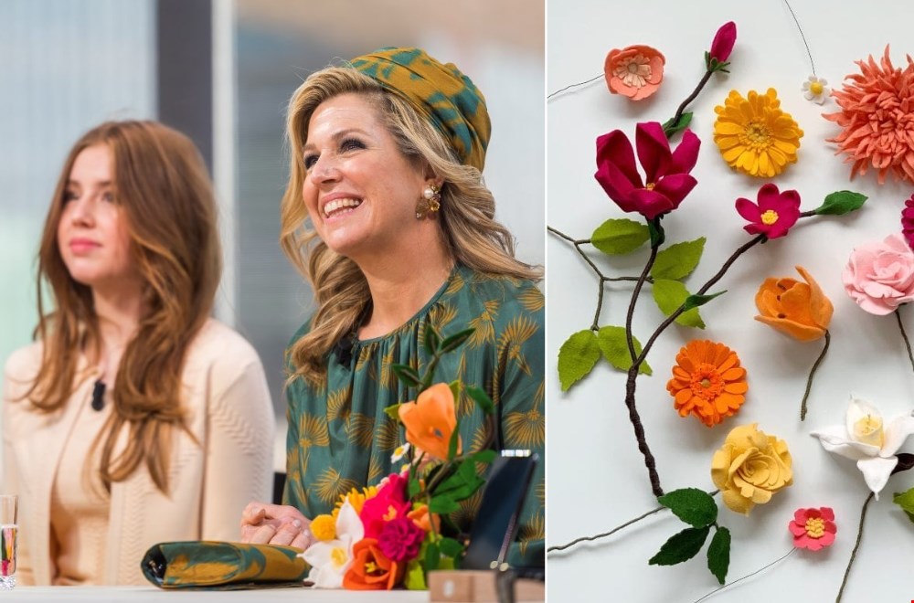 Koningin Maxima stralend met de viltbloemen. © Twycer / www.twycer.nl